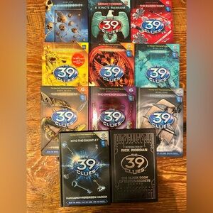 The 39 Clues Series Books 1–10 + Black Book of Buried Secrets - Hard cover